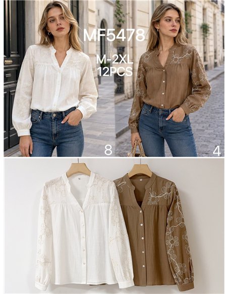 Blusa con bordado floral en mangas
