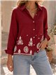 Camicia con ricami traforati