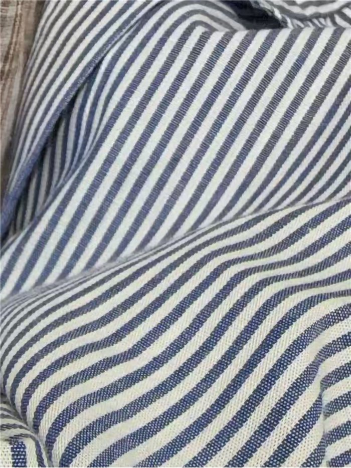 Blusa rayas con volante lateral