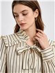 Blusa rayas con lazada y volante