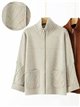 Chaqueta de punto rombos con cremallera y cuello alto