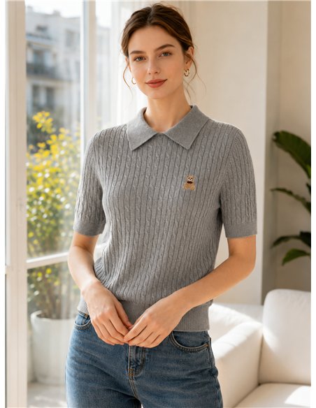 Jersey de punto trenzado con osito cuello polo