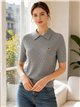 Jersey de punto trenzado con osito cuello polo