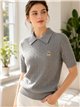Jersey de punto trenzado con osito cuello polo