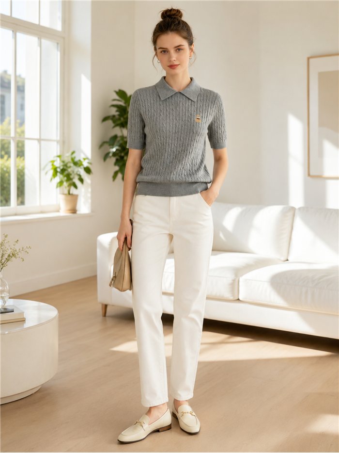 Jersey de punto trenzado con osito cuello polo