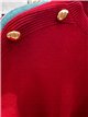 Jersey con botones dorados y bolsillos
