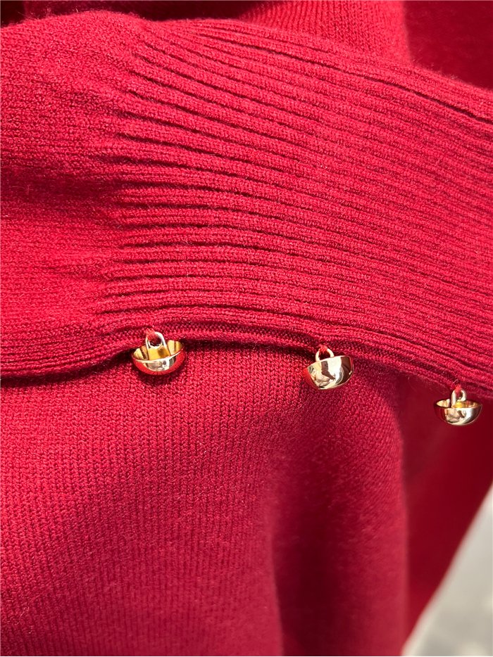 Jersey soft con botones dorados en puño