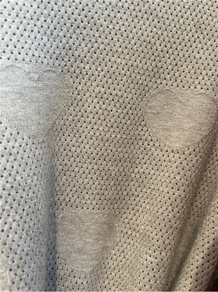 Jersey calado detalle corazón con hilo metalizado