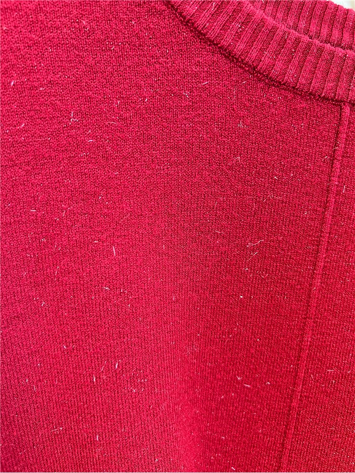 Jersey detalle costura central con hilo metalizado
