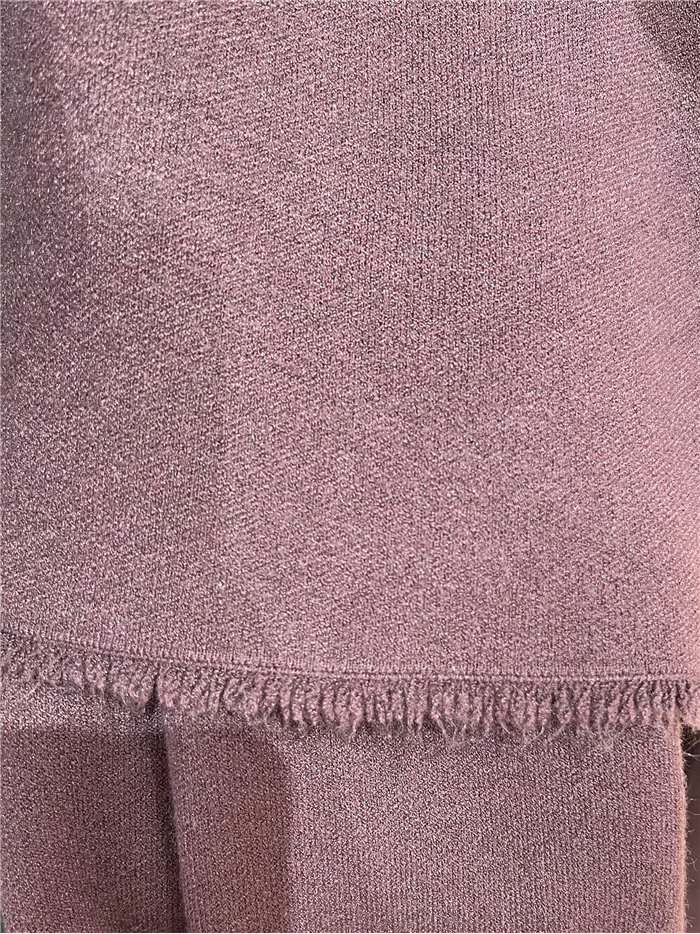 Conjunto jersey bajo desflecado y pantalón wide leg