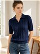 Jersey trenzado cuello polo