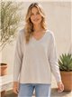 Jersey amplio pico con bajo desigual