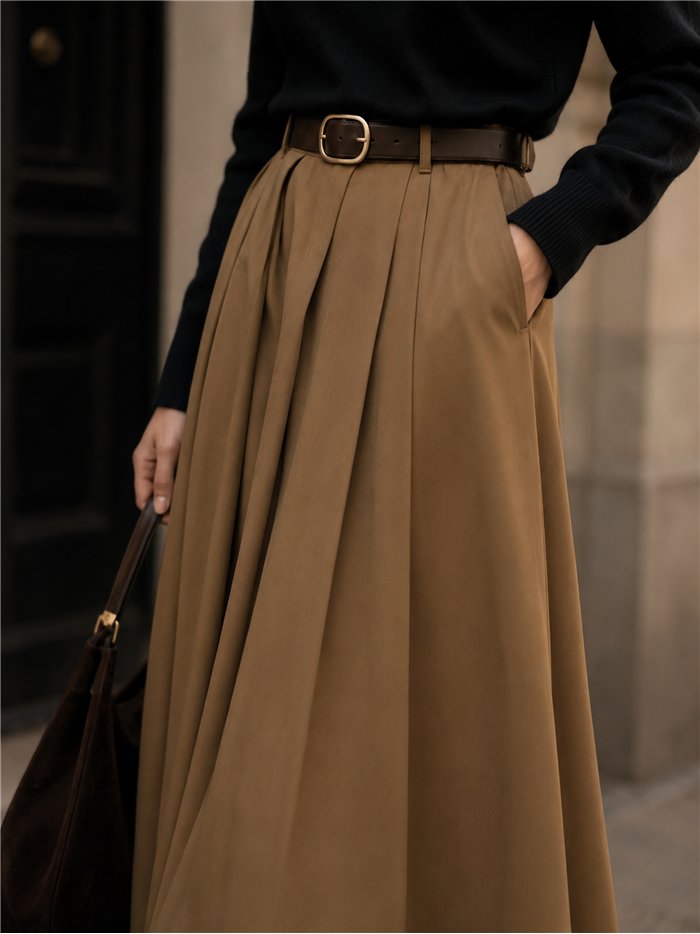 Falda midi con tablas y cinturón