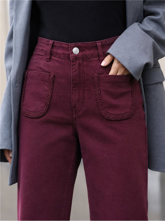 Calça jeans de perna larga com bolsos trançados