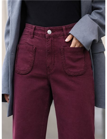 Calça jeans de perna larga com bolsos trançados