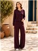 Conjunto chaqueta de botones dorados y pantalón wide leg