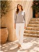 Veste en maille à col rond et boutons dorés