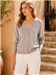 Chaqueta de punto cuello pico con botones dorados