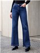 Jeans flare bajo desflecado