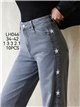 Jeans wide leg estrellas bordadas y tachas