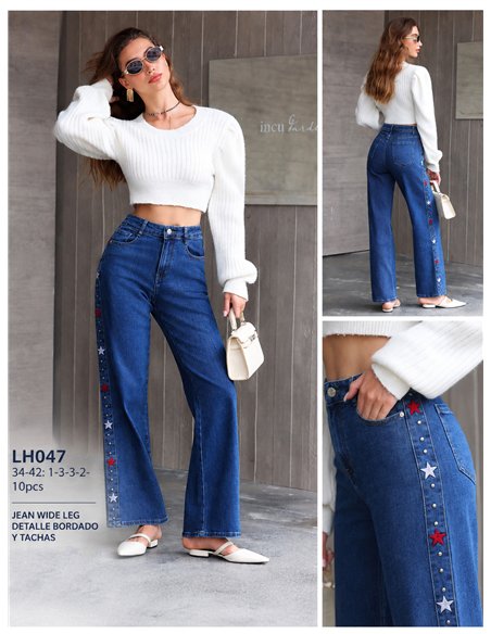 Jeans wide leg estrellas bordadas y tachas