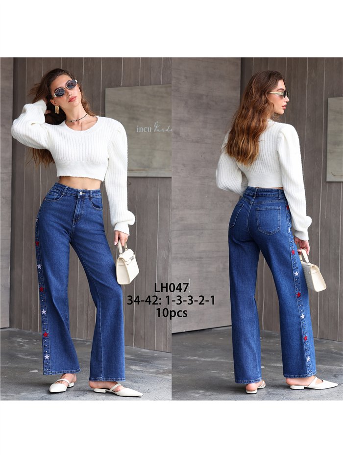 Jeans wide leg estrellas bordadas y tachas