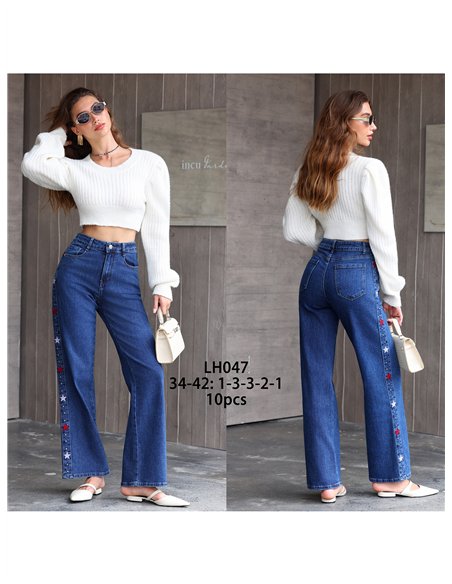 Jeans wide leg estrellas bordadas y tachas
