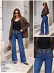 Jeans wide leg cintura bordada con tachas