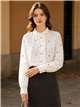 Blusa corazoncitos bordados y volante