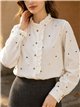 Blusa corazoncitos bordados y volante