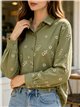 Camisa bordada de flores y paisley