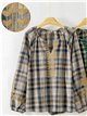 Blusa cuadros con bordado
