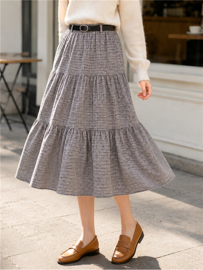 Falda midi de cuadros con volantes