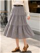 Falda midi de cuadros con volantes
