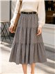 Falda midi de cuadros con volantes