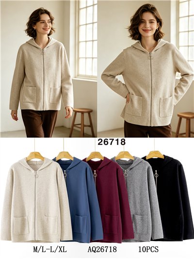 Jaqueta de tricô oversized com capuz e bolsos frontais. 2