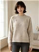 Camisa com pompons em relevo