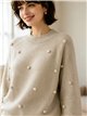 Camisa com pompons em relevo