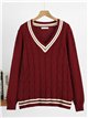 Pull oversize à col en V en maille torsadée avec détails contrastés