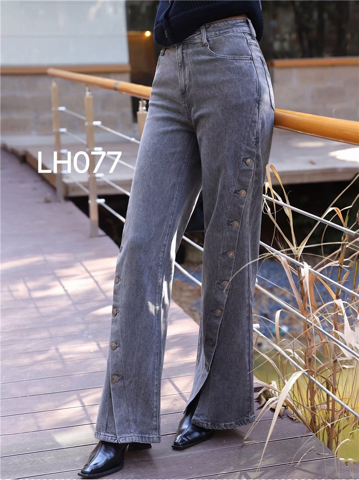 Jeans wide leg botones laterales