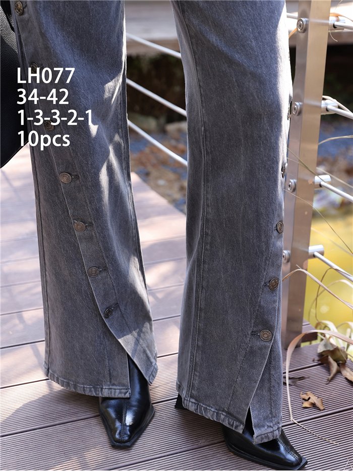 Jeans wide leg botones laterales