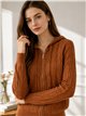 Veste en maille tressée à capuche