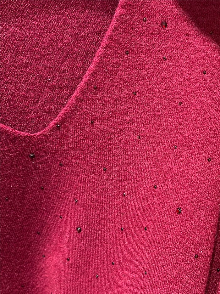 Jersey punto fino cuello pico strass