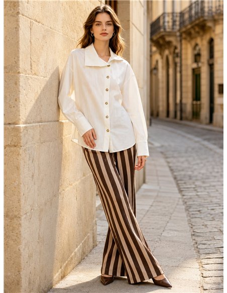 Camisa amplia botonadura lateral