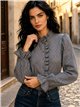 Camicia a quadretti con volant centrale
