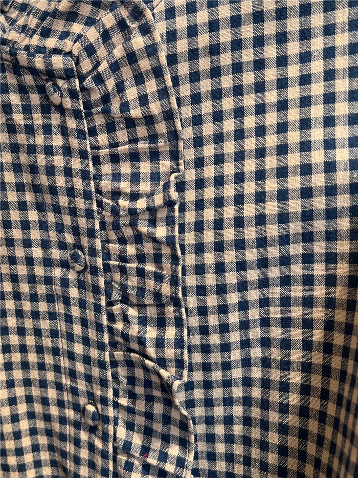 Camicia a quadretti con volant centrale