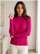 Jersey canalé cuello alto con mini lentejuelas