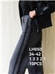 Jeans a gamba larga con frange laterali