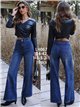 Jeans wide leg tachuelas en cintura