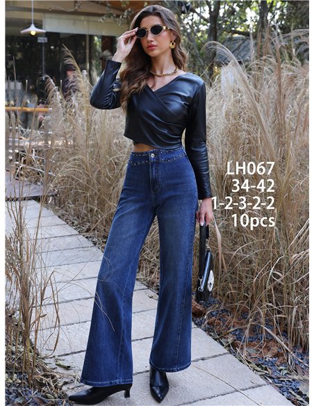 Jeans wide leg tachuelas en cintura